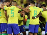 Brazil's Marquinhos and teammates players huddle on November 22, 2023