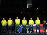 Australia players line up during the national anthems before the match on November 24, 2023
