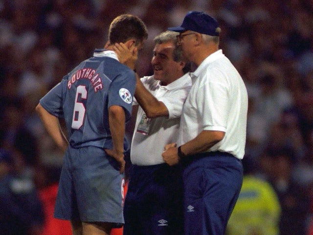 England Manager Terry Venables and Don Howe console Gareth Southgate after his penalty miss during the shoot out with Germany which costs England a place in the final at Euro 96