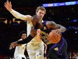 Los Angeles Lakers forward LeBron James (23) moves to the basket against Utah Jazz forward Lauri Markkanen on November 21, 2023