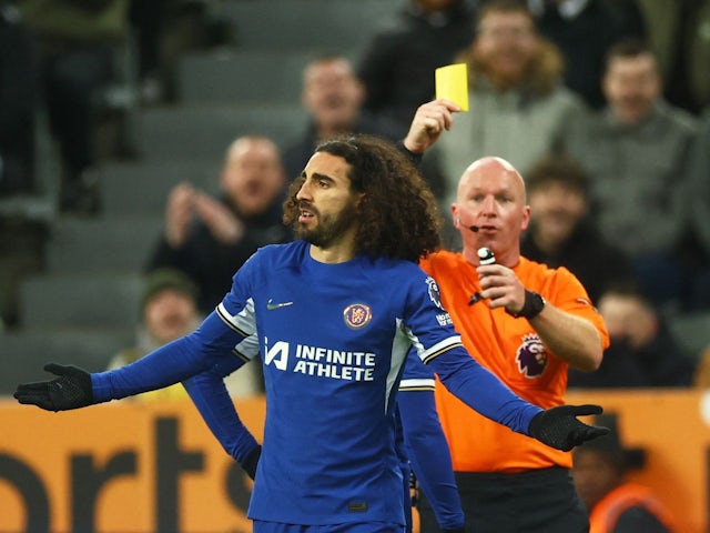 Chelsea's Marc Cucurella is shown a yellow card by Simon Hooper on November 25, 2023.