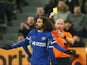 Chelsea's Marc Cucurella is shown a yellow card by referee Simon Hooper on November 25, 2023