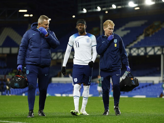 England Under-21s's Noni Madueke walks off the pitch after sustaining an injury on November 21, 2023