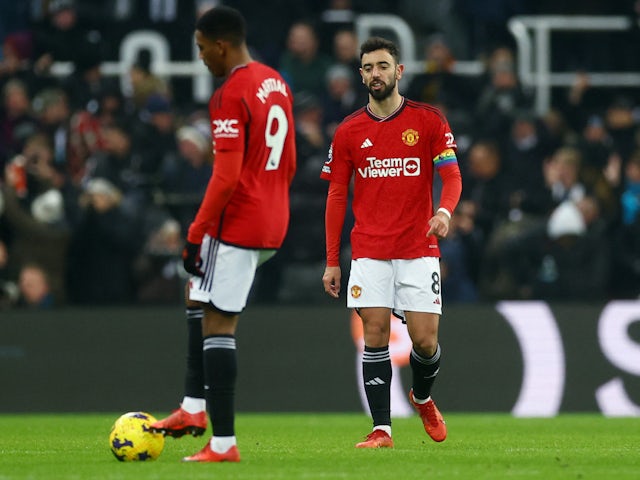 Manchester United's Bruno Fernandes looks dejected after Newcastle United's Anthony Gordon scores their first goal on December 2, 2023