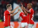 Benfica's Joao Mario celebrates scoring their first goal with Casper Tengstedt on November 29, 2023