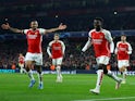 Arsenal's Bukayo Saka celebrates scoring their third goal with Gabriel Jesus on November 29, 2023