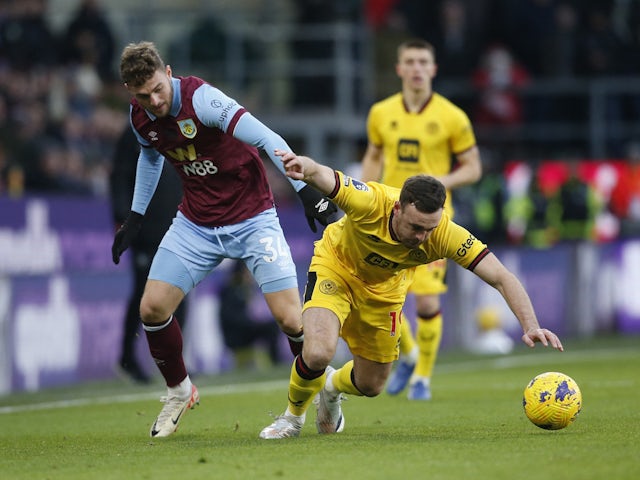 Burnley's Jacob Bruun Larsen in action with Sheffield United's Jack Robinson on December 2, 2023