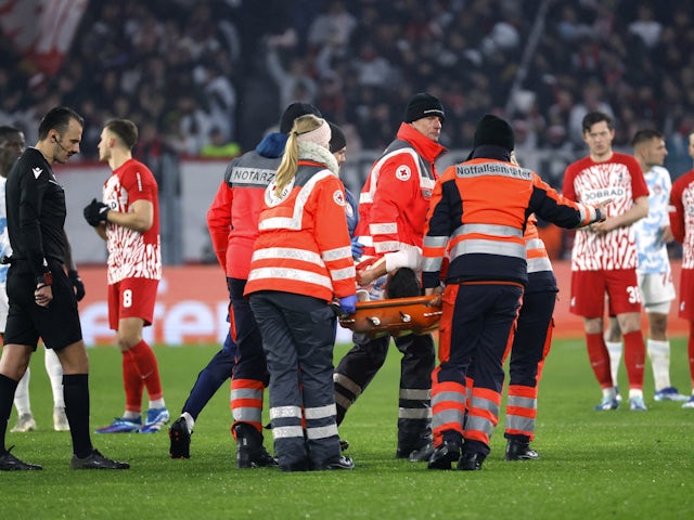Olympiacos' Daniel Podence is stretchered off after sustaining an injury on November 30, 2023
