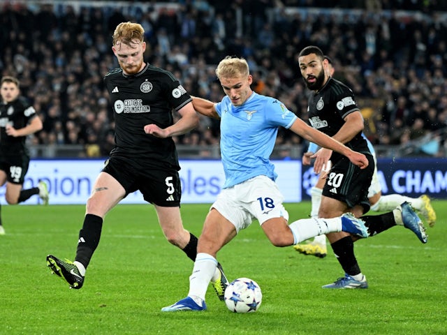 Lazio's Gustav Isaksen in action with Celtic's Liam Scales on November 28, 2023