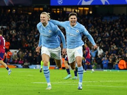 Manchester City's Julian Alvarez celebrates scoring their third goal with Erling Haaland on November 28, 2023