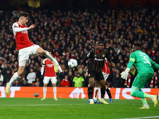 Arsenal's Kai Havertz scores their first goal past Lens' Brice Samba on November 29, 2023