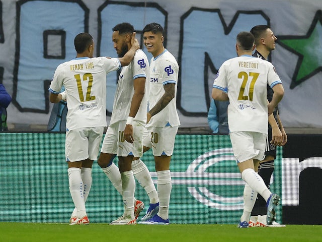Marseille's Pierre-Emerick Aubameyang celebrates scoring their third goal with teammates on November 30, 2023