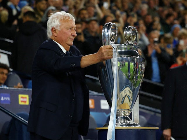 Former Manchester City footballer Mike Summerbee with the Champions League trophy before the match on September 19, 2023