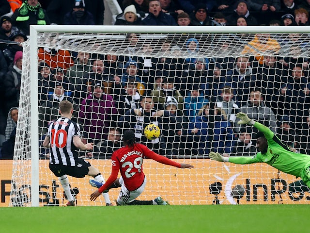 Newcastle United's Anthony Gordon scores their first goal  on December 2, 2023