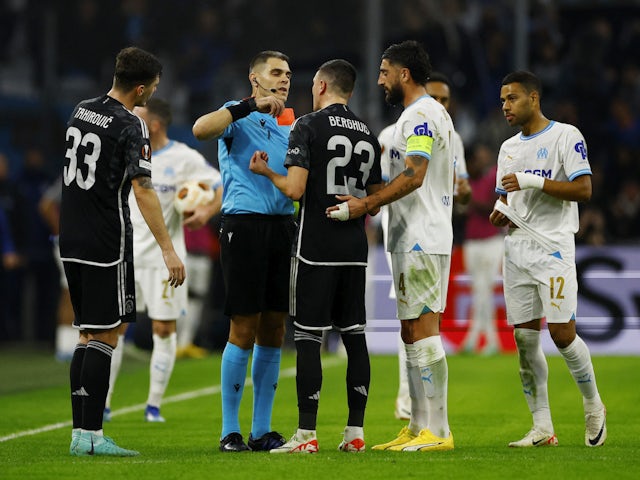 Ajax's Steven Berghuis is shown a red card by referee Simone Sozza on November 30, 2023