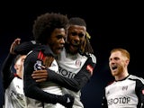 Fulham's Willian celebrates scoring their third goal with teammates on November 27, 2023