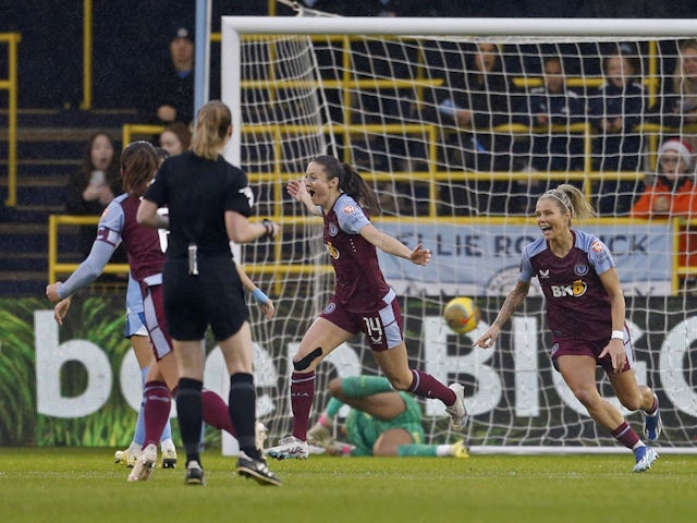 Aston Villa Women's Danielle Turner celebrates scoring their first goal with teammates on December 9, 2023