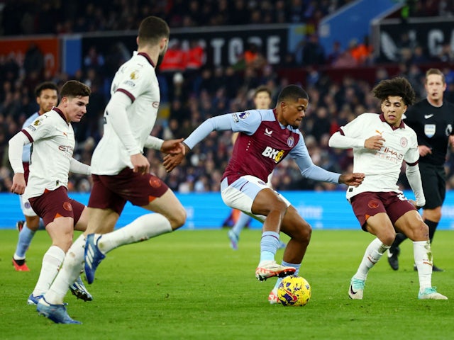 Aston Villa's Leon Bailey in action with Manchester City's Rico Lewis on December 6, 2023
