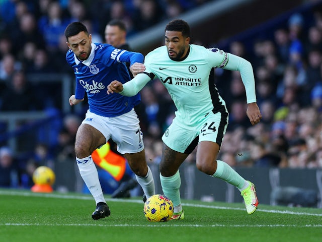 Chelsea's Reece James in action with Everton's Dwight McNeil on December 10, 2023