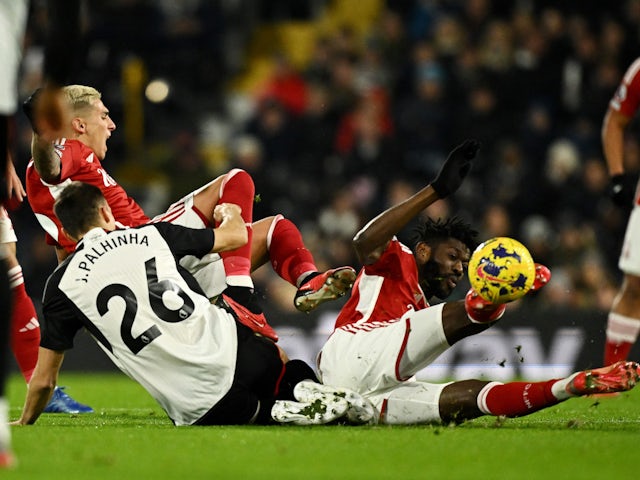 Fulham's Joao Palhinha in action with Nottingham Forest's Ibrahim Sangare on December 6, 2023
