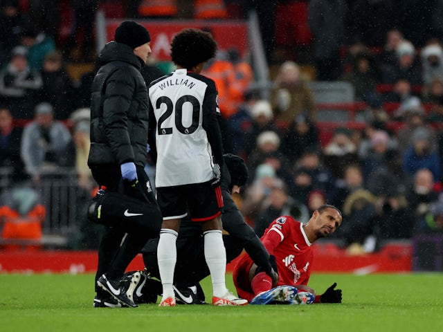 Liverpool's Joel Matip receives medical attention after sustaining an injury on December 3, 2023