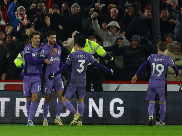 Liverpool's Dominik Szoboszlai celebrates scoring their second goal with Curtis Jones, Harvey Elliott and Wataru Endo on December 6, 2023