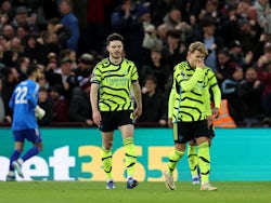 Arsenal's Declan Rice and Martin Odegaard look dejected after Aston Villa's John McGinn scores their first goal on December 9, 2023