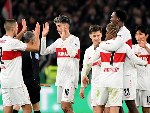 VfB Stuttgart's Atakan Karazor with teammates celebrate after the match on December 6, 2023