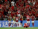 Al Ahly's Hussein El-Shahat celebrates scoring their second goal with teammates on December 15, 2023