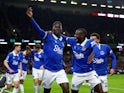 Everton's Amadou Onana celebrates scoring their first goal with Abdoulaye Doucoure on December 16, 2023