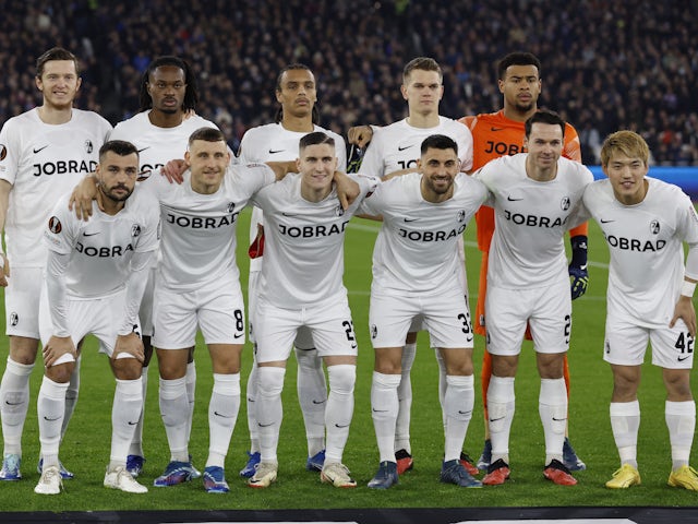 Freiburg players pose for a team group photo before the match on December 14, 2023