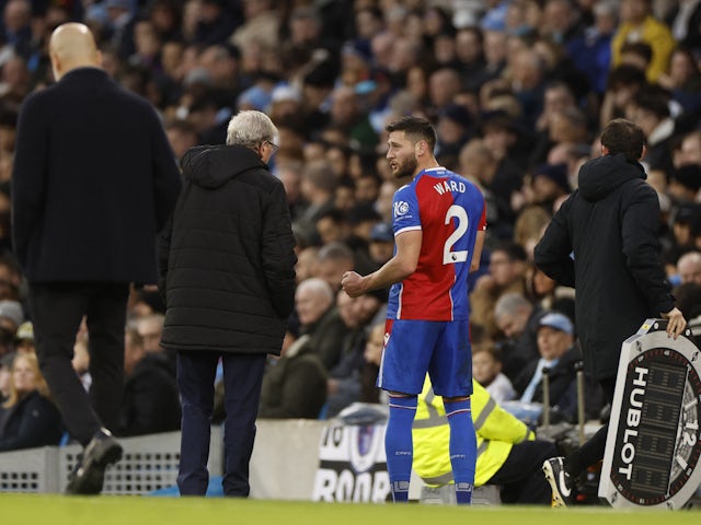 Crystal Palace's Joel Ward with manager Roy Hodgson after being substituted on December 16, 2023