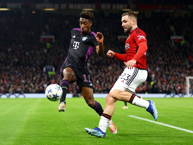 Bayern Munich's Kingsley Coman in action with Manchester United's Luke Shaw on December 12, 2023
