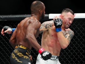 Edwards makes Covington pay to defend world title at UFC 296