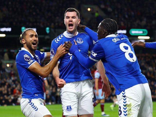 Everton's Michael Keane celebrates scoring their second goal with Dominic Calvert-Lewin and Amadou Onana on December 15, 2023
