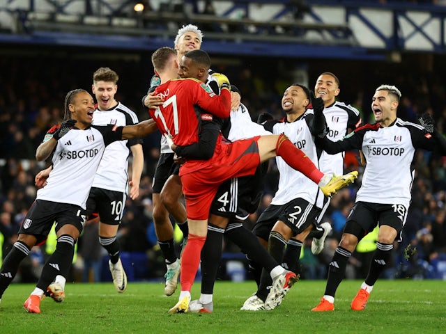 Fulham's Bernd Leno and teammates celebrate after winning the penalty shootout on December 19, 2023