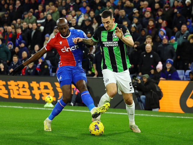 Crystal Palace's Jean-Philippe Mateta in action with Brighton & Hove Albion's Lewis Dunk on December 21, 2023
