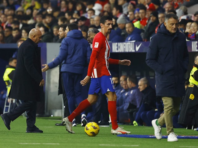 Atletico Madrid's Stefan Savic reacts after being shown a red card by referee Jose Luis Munuera Montero on December 19, 2023