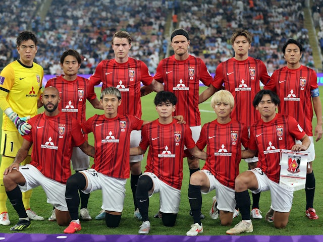 Urawa Red Diamonds players pose for a team group photo before the match on December 19, 2023