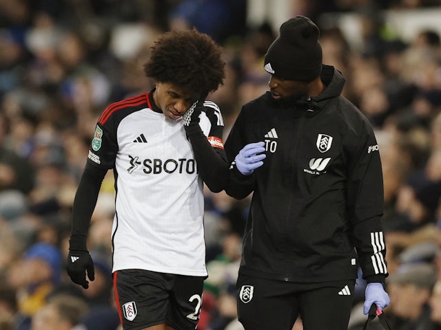 Fulham's Willian reacts after sustaining an injury on December 19, 2023