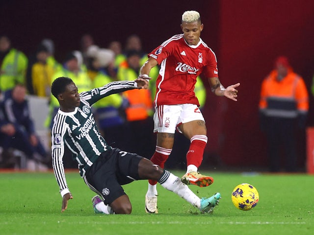 Manchester United's Kobbie Mainoo in action with Nottingham Forest's Danilo on December 31, 2023