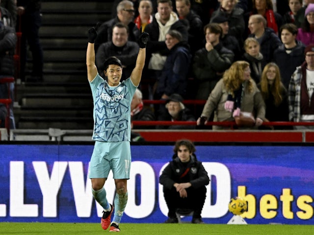 Wolverhampton Wanderers' Hwang Hee-chan celebrates scoring their second goal on December 27, 2023