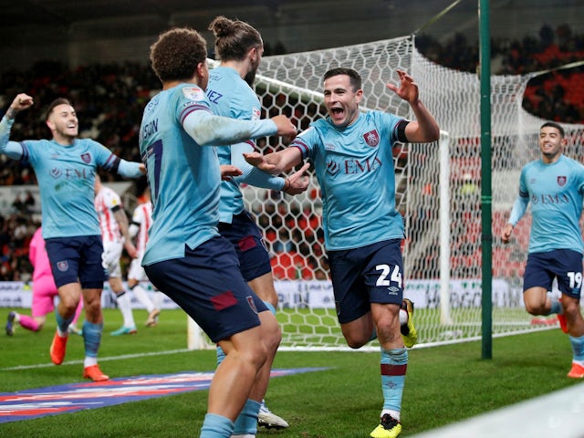 Burnley's Josh Cullen celebrates scoring their first goal with teammates on December 30, 2022
