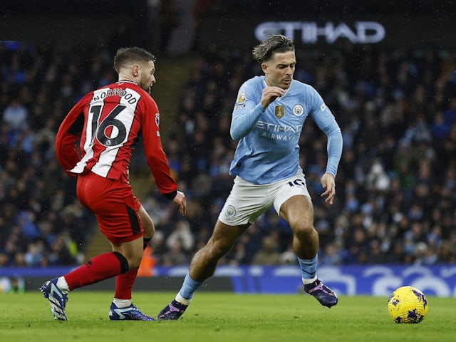 Manchester City's Jack Grealish in action with Sheffield United's Oliver Norwood on December 30, 2023