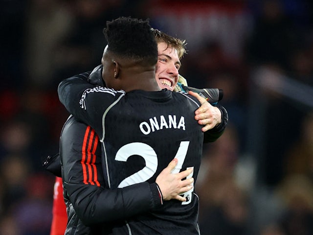 Manchester United's Rasmus Hojlund and Andre Onana celebrate after the match on December 26, 2023