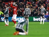 Manchester United's Scott McTominay and Raphael Varane react after Nottingham Forest's Morgan Gibbs-White scores their second goal  on December 30, 2023