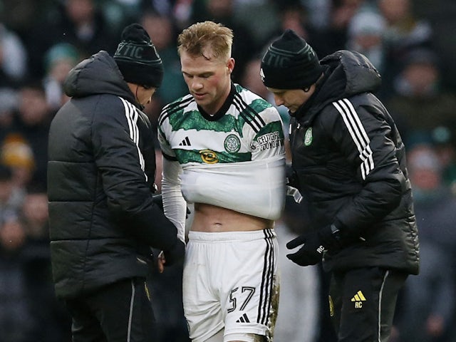 Celtic's Stephen Welsh reacts after sustaining an injury on December 30, 2023