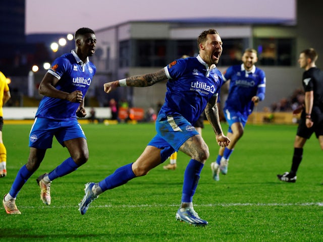 Eastleigh's Chris Maguire celebrates scoring their first goal on January 6, 2024