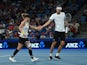 Germany's Alexander Zverev and Laura Siegemund react during their mixed doubles final match against Poland's Iga Swiatek and Hubert Hurkacz on January 7, 2024