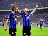 Inter Milan's Lautaro Martinez celebrates scoring their first goal with Henrikh Mkhitaryan on January 6, 2024